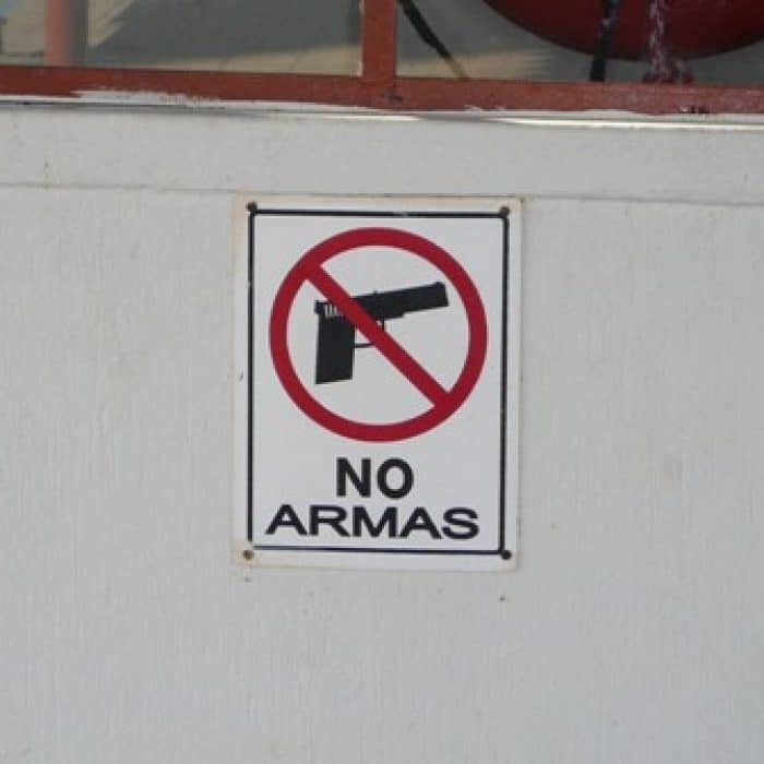 Is Guatemala Safe? No Guns Sign in Zacapa Guatemala