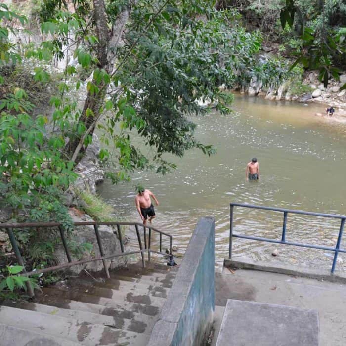 Handy stairs lead into the water at the natural bathing pools at Pasabien Guatemala 