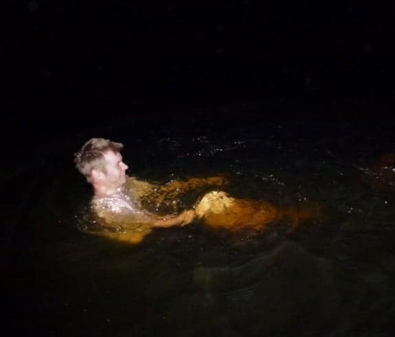 Man swimming bioluminescence at Manialtepec Lagoon near Puerto Escondido #Oaxaca 