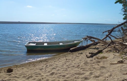 Boat on a sandbank in an estuary near Puerto Escondido. 