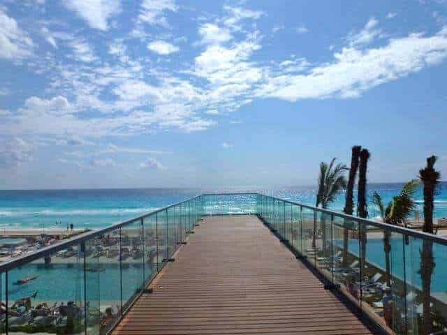 Dramatic walkway overlooking the Caribbean at Secrets The Vine.