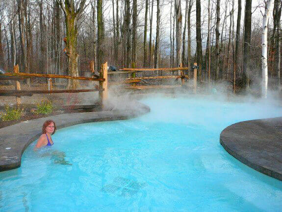 Woman in the Forest Pool at Scandinave Spa Blue Mountain.