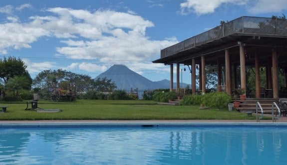 Pool with a view of a volcano in Panajachel, Guatemala. 