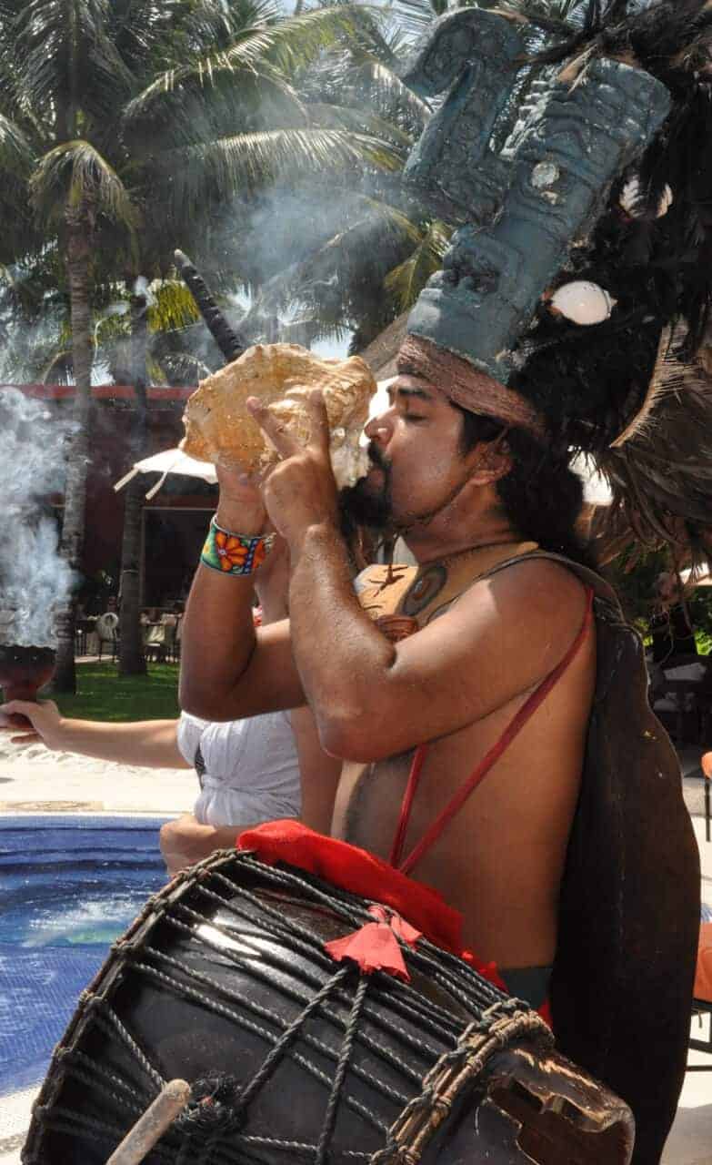 Shaman performing purification ritual at Zoetry resort in Mexico. 