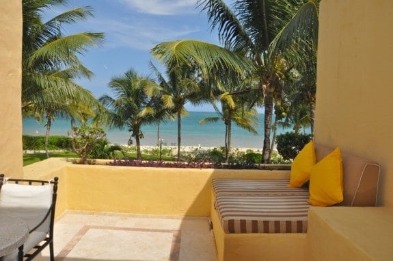 Terrace with view of the Caribbean at Khiva Villa room at Zoetry Resort in Mexico. 