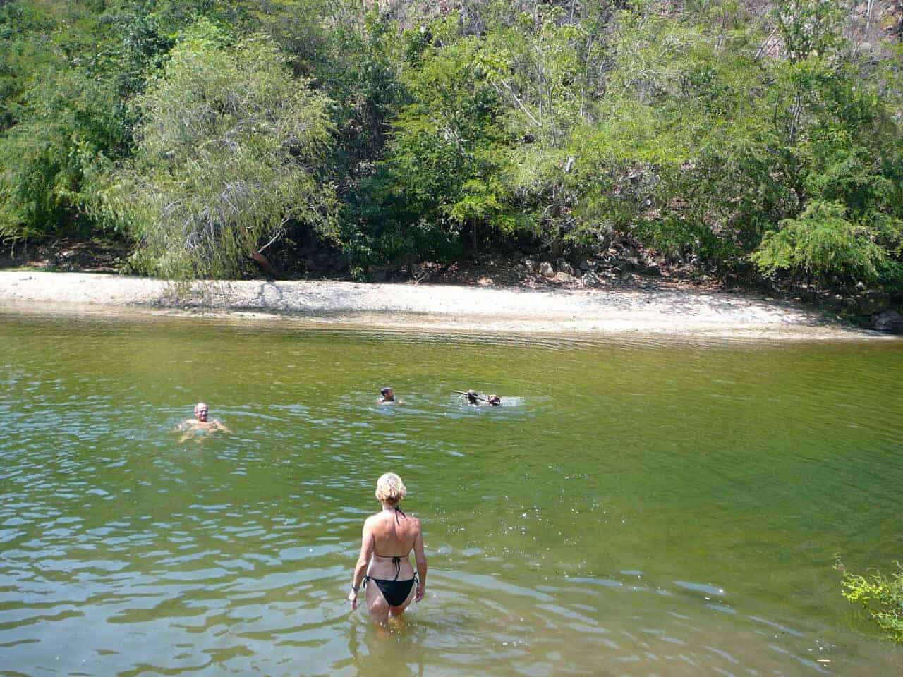 Manialtepec river with dogs and people swimming enroute to Atotonilco hot springs.