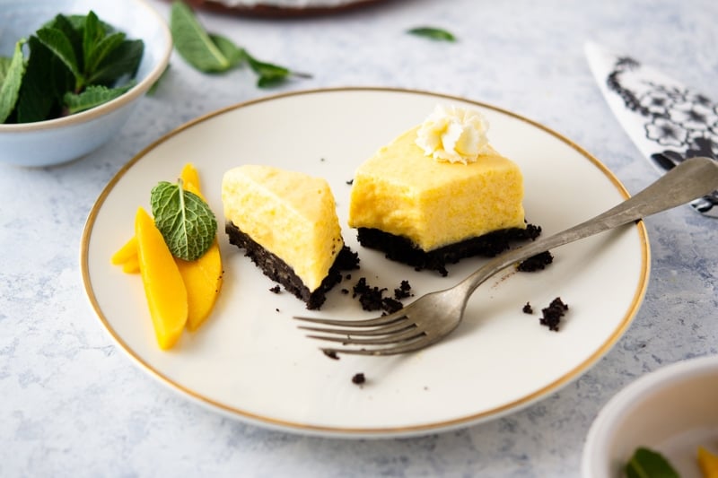 No-Bake Mango Pie on a plate garnished with mint and mango 