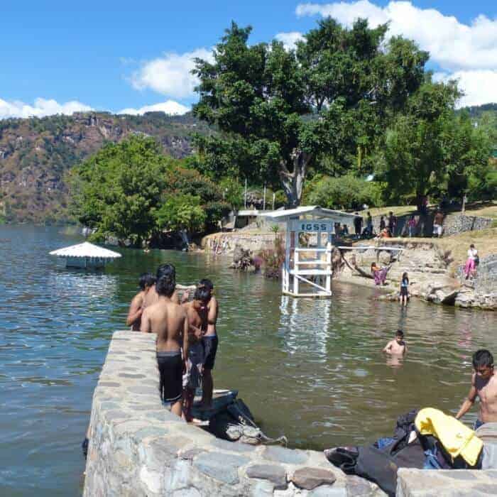 Boys swimming in Lake Atitlan, Guatemala. 