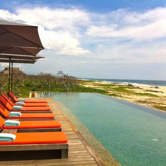 Lounge chairs by the pool at Hotel Escondido, Oaxaca Mexico.