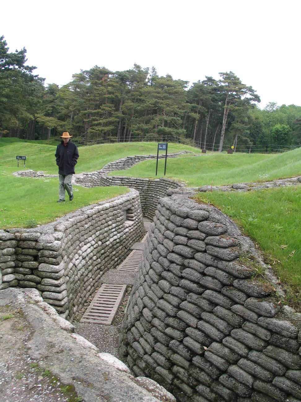 Man walking beside a Canadian trench at Vimy Ridge France 