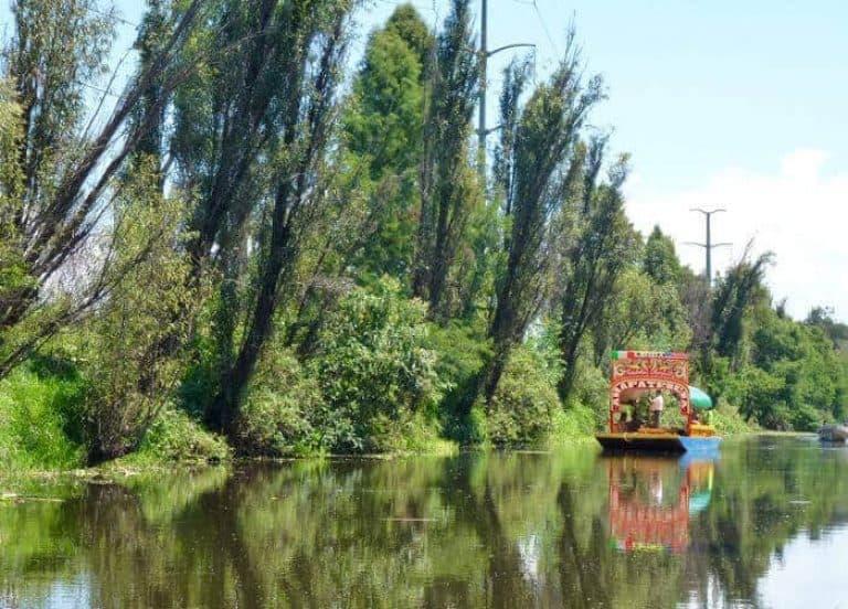 Boat in a canal at Xochimilco Mexico City.