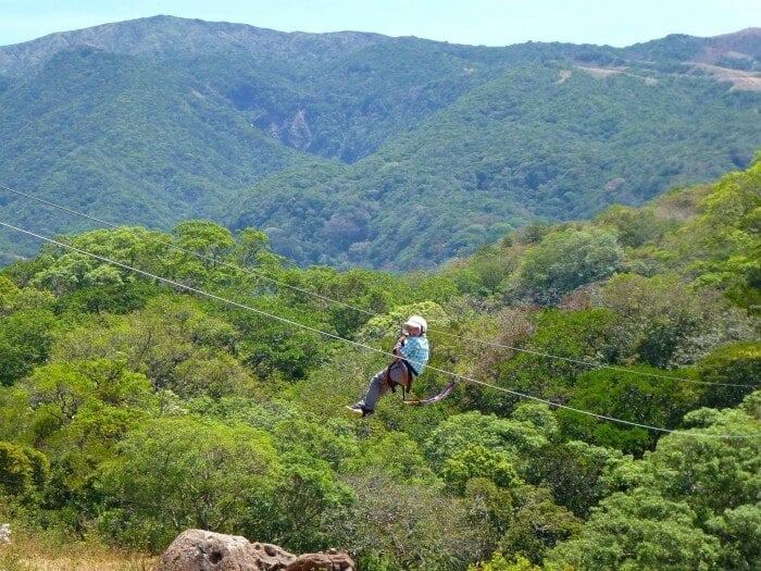 Zip-lining or canopy tours are a thrilling way to experience Costa Rica's volcanoes and rainforest