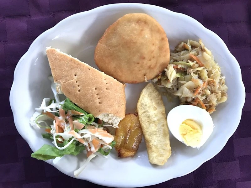 A Grenadian breakfast of saltfish sous and bake