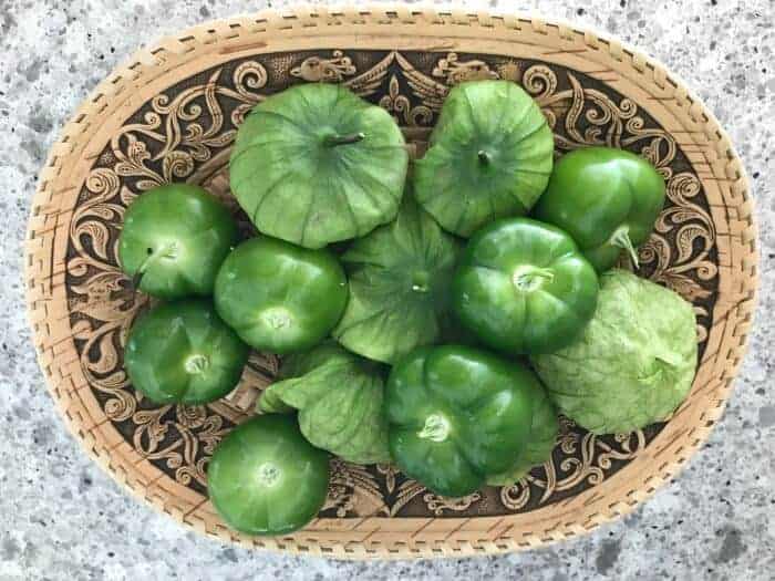 A basket of tomatillos known as miltomate in Guatemala.