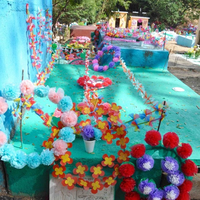 Decorated grave in a cemetery on Day of the Dead in Guatemala