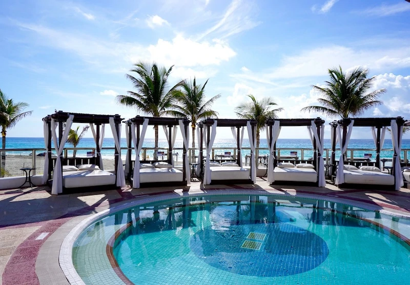 Beach loungers and cabanas at Hyatt Zilara Cancun - best all-inclusive resorts in Cancun