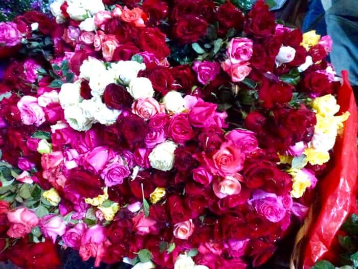 red, pink and white roses in the Benito Juarez Mercado in Puerto Escondido Mexico. 