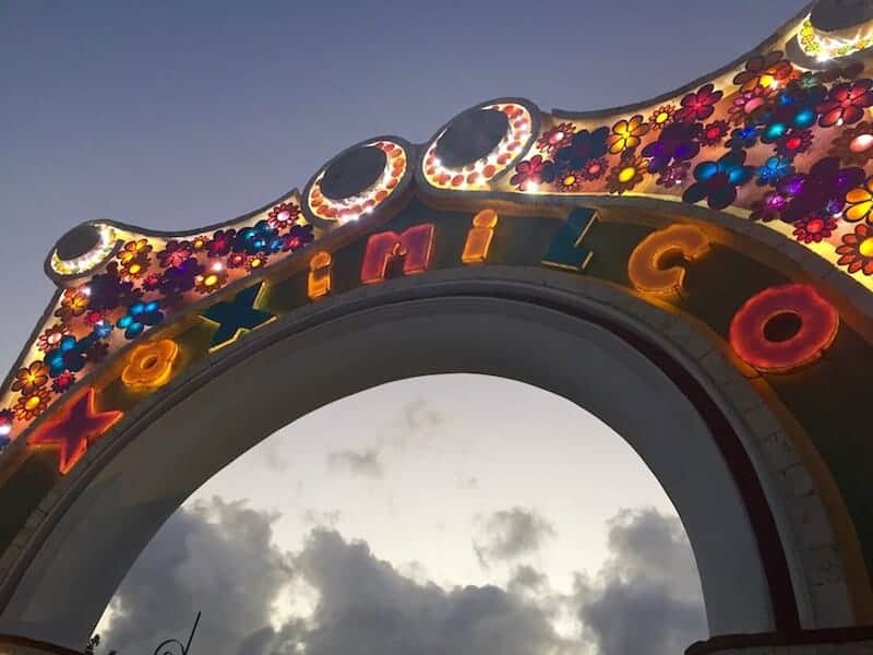 View of the archway at Xoximilco Cancun in the evening. 