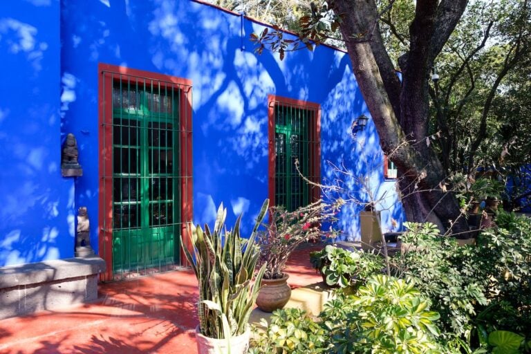 Colorful courtyard at the Frida Kahlo Museum in Mexico City.