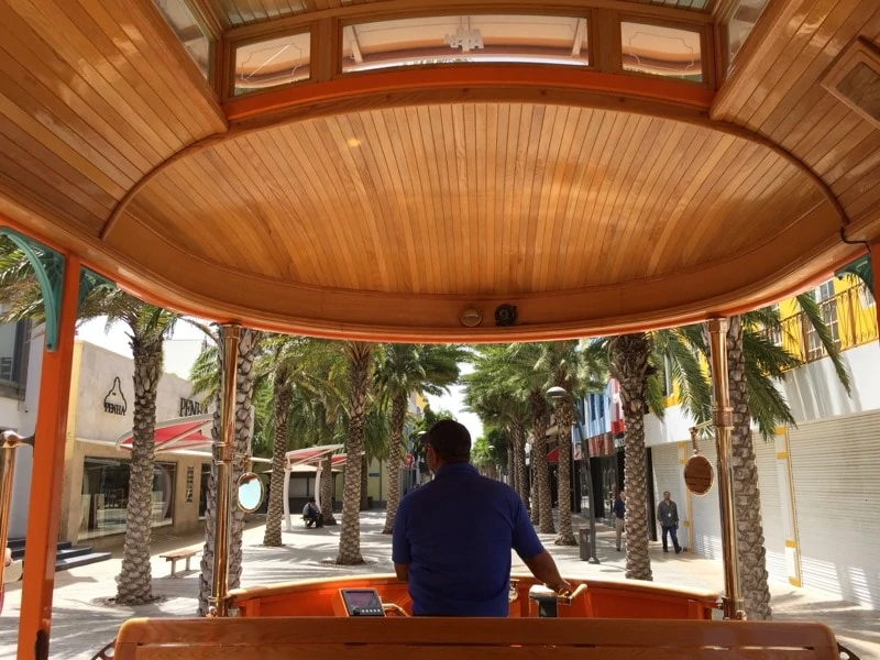 Hop on the free trolley to explore the restaurants in downtown Oranjestad Aruba