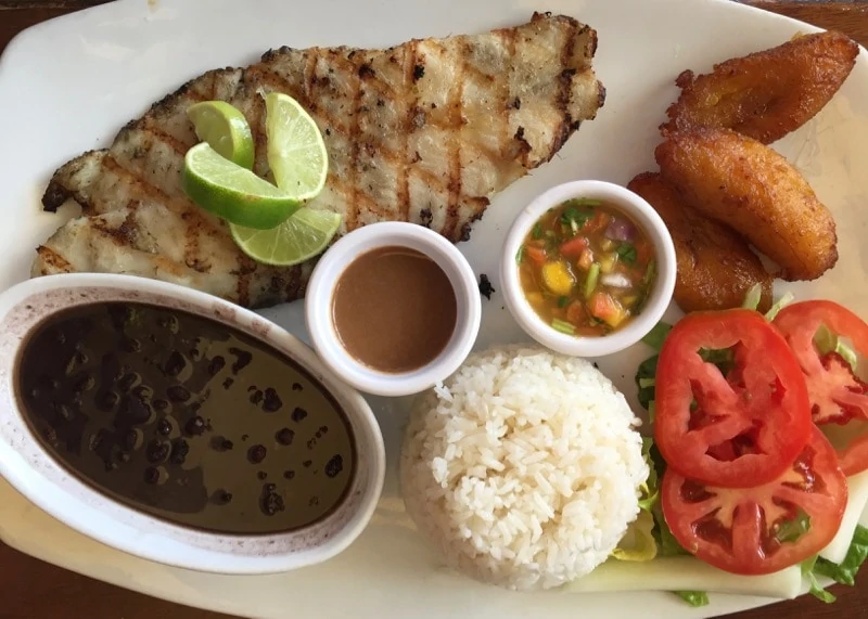 grilled grouper with fresh mango salsa and sweet fried plantain at Cuba's Cookin' in Aruba 