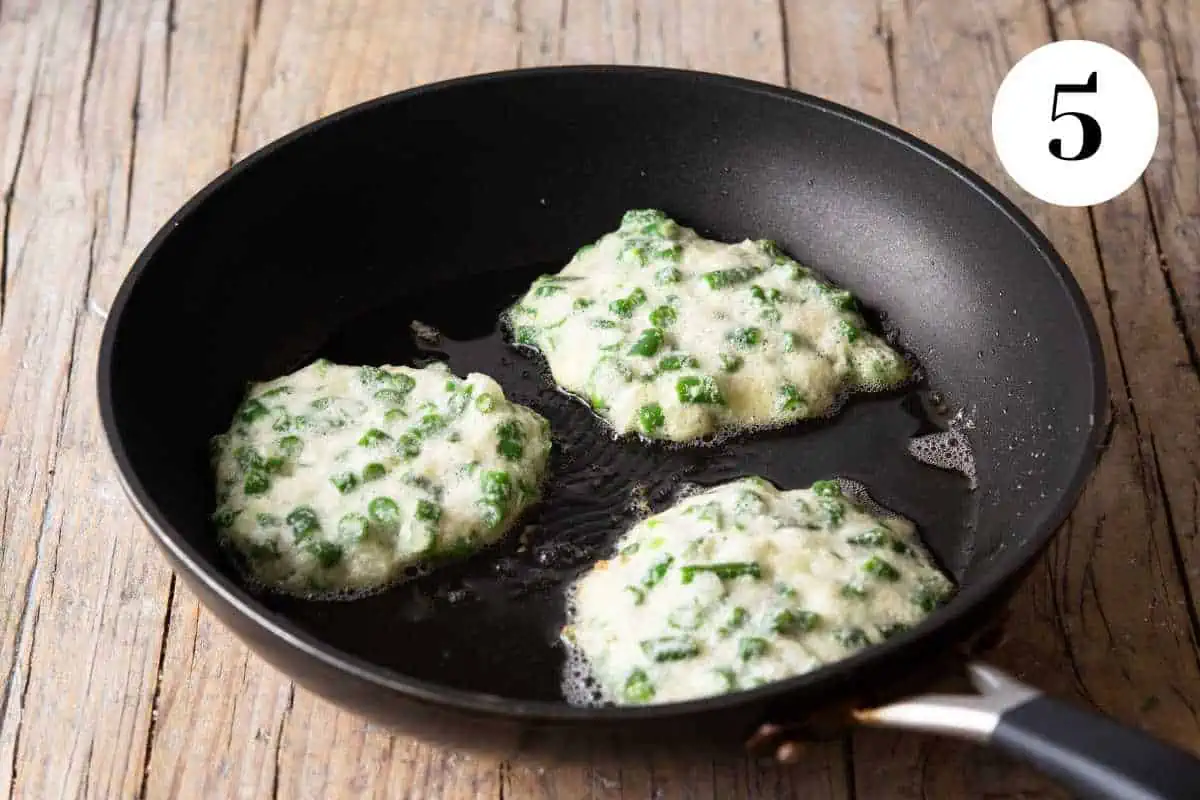 Mini omelettes frying in a pan