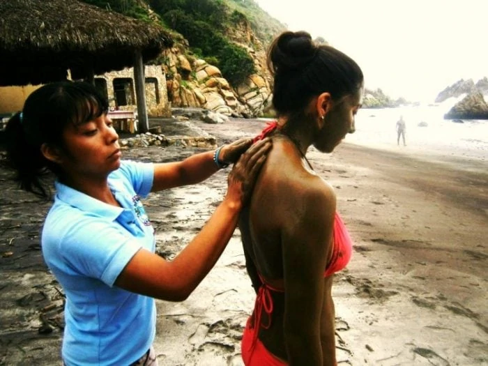 Mud bath at La Bocana Beach Huatulco