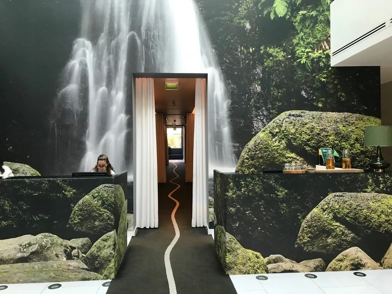 Modern lobby of Furnas Boutique Hotel where thermal waters and a spa await in the Azores