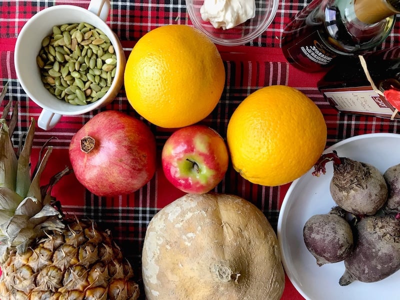 Ingredients for Ensalada de Nochebuena Mexicana include fresh oranges, jicama, pomegranate, pineapple and beets