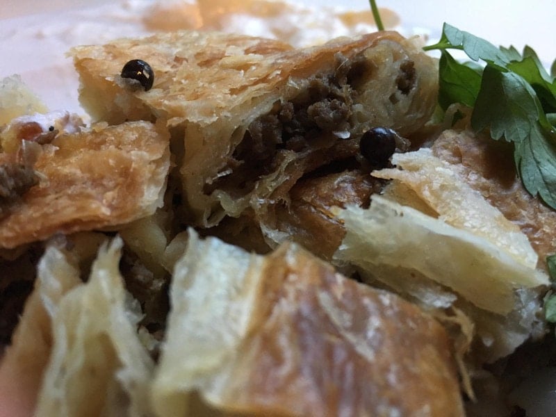 Pieces of Turkish Börek sliced on a plate. 