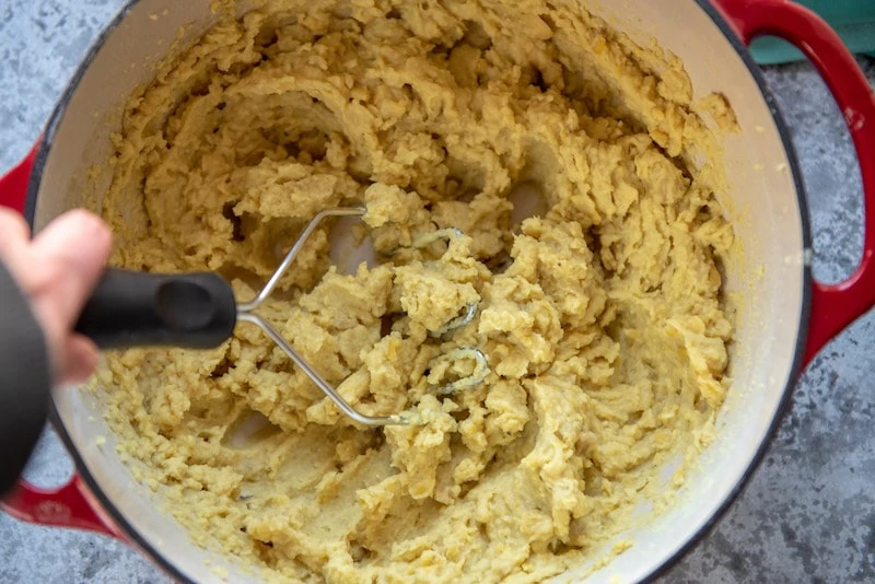 Mashing fava beans for Fava Bean Puree in Salento, Italy. 