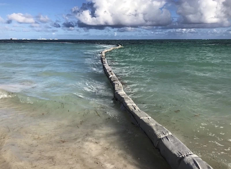 A barrier installed to block an influx of sargassum seaweed in Punta Cana