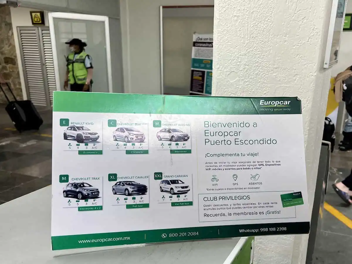 A car rental sign at Puerto Escondido Airport. 