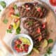 Grilled steak marinated in beer with salsa fresca.