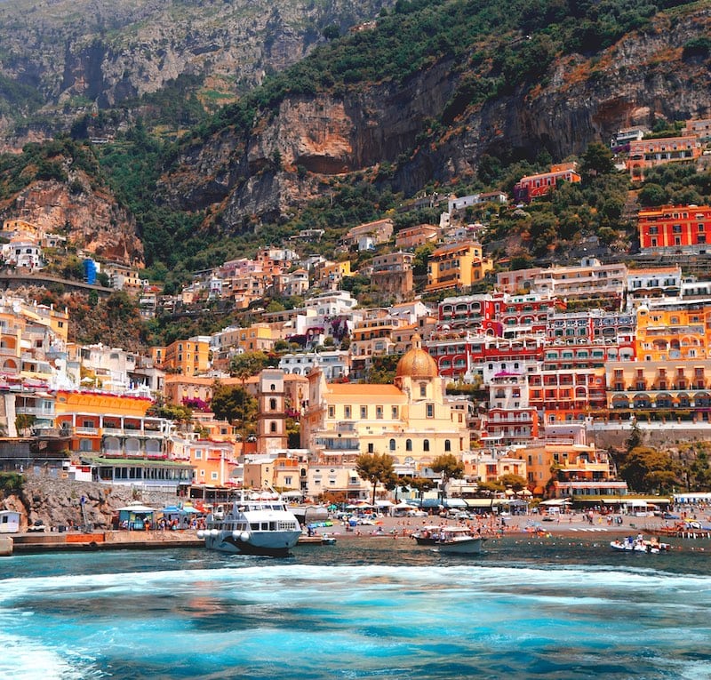 https://www.atastefortravel.ca/wp-content/uploads/2019/08/View-from-the-water-of-Positano-jordan-steranka-z0L0mo__9bg-unsplash-2.jpg