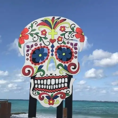 Decorated skull on the beach for Day of the Dead in Cancun, Mexico.