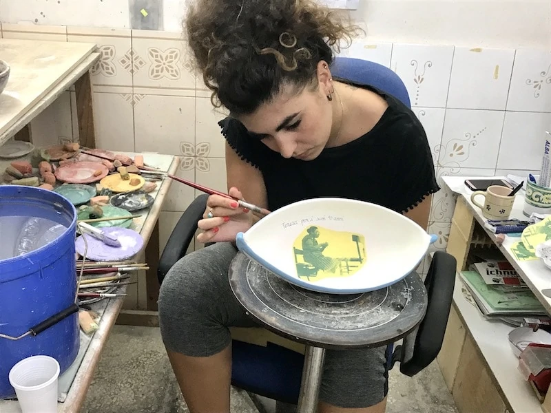 Painting ceramics at La Bottega in Puglia