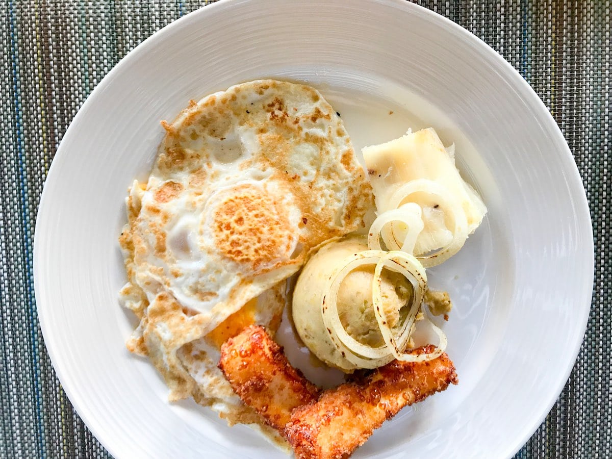 Mangú or mashed plantain with fried egg at breakfast in Punta Cana.