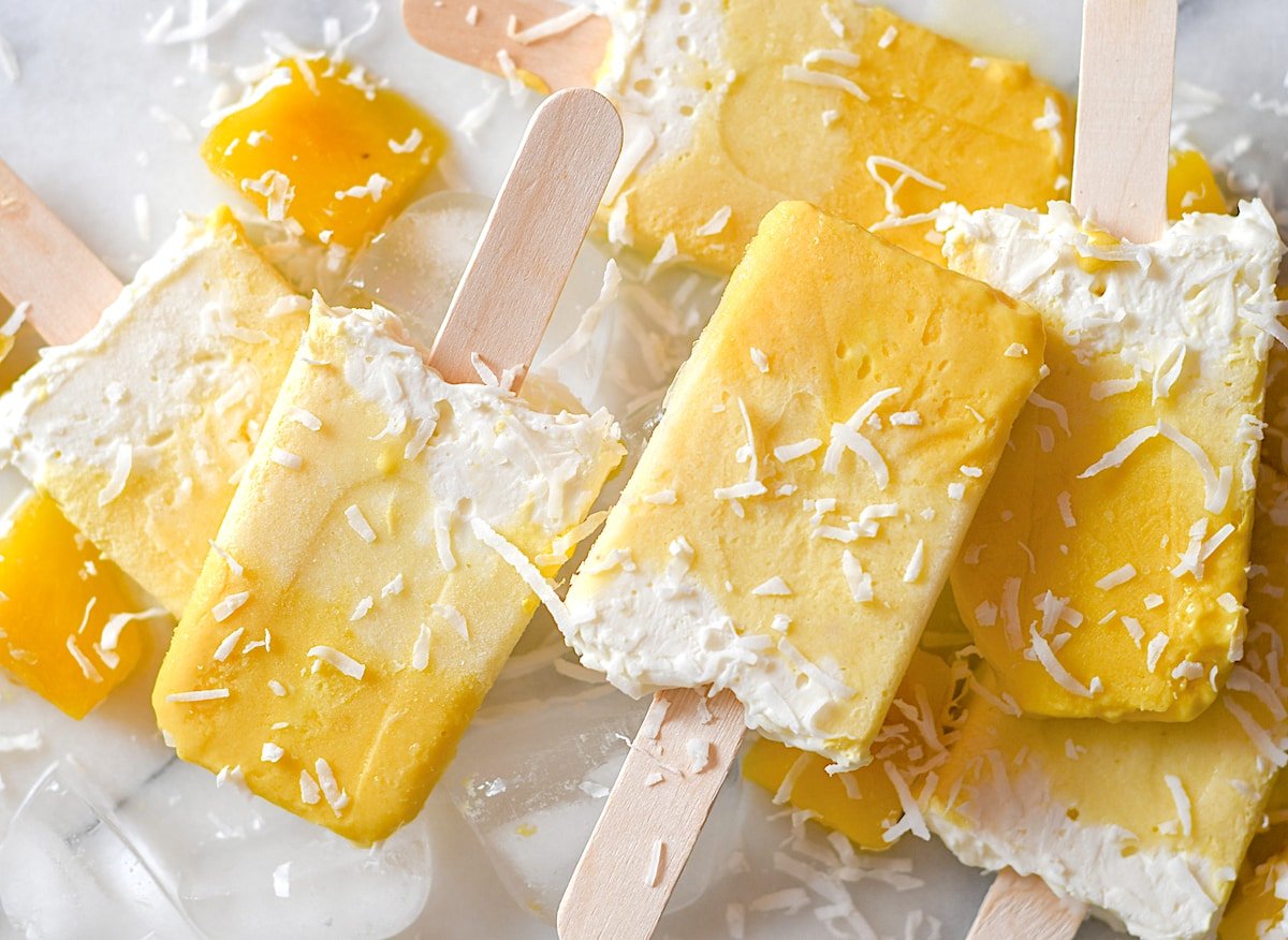 Overhead photo of Pina Colada Mango Ice Cream Pops.