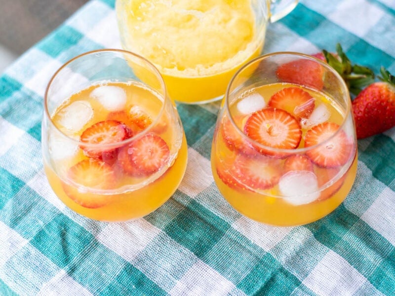 Fresh Strawberry Mango Lemonade on Blue Tablecloth ipe