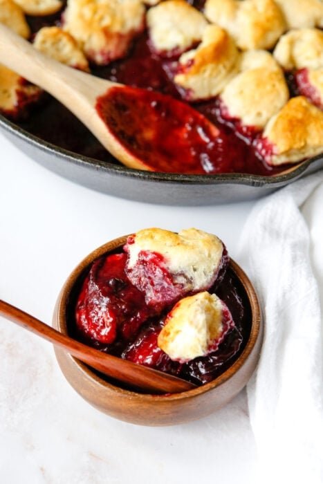 bowl of gluten-free cooked plums in a bowl with topping