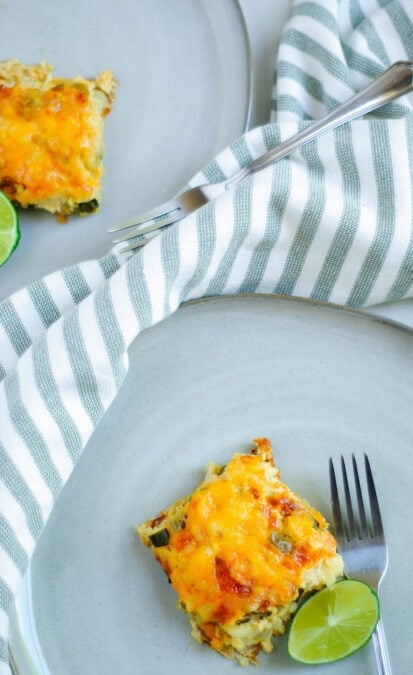 Spanish breakfast casserole with fork on a blue plate. 