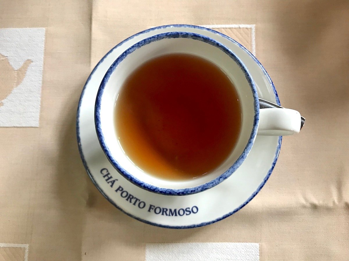 Cup of orange pekoe tea at Porto Formoso tea factory in the Azores.