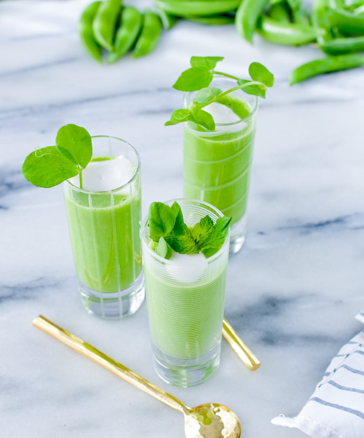 Chilled pea soup in shooter glasses. 
