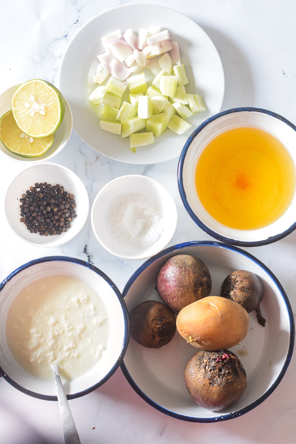 Ingredients fpr beet gazpacho include fresh beets, potato, onion, cucumber, broth and pumpkin seed garnish.