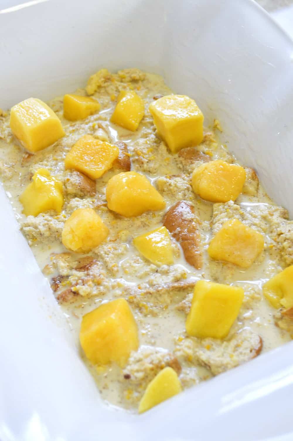 Mango chunks layered in the bread.