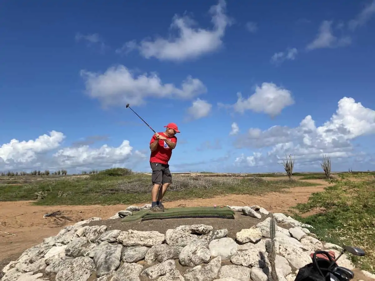 Man golfing at Piedra So Golf Course. Credit Eric Gietman