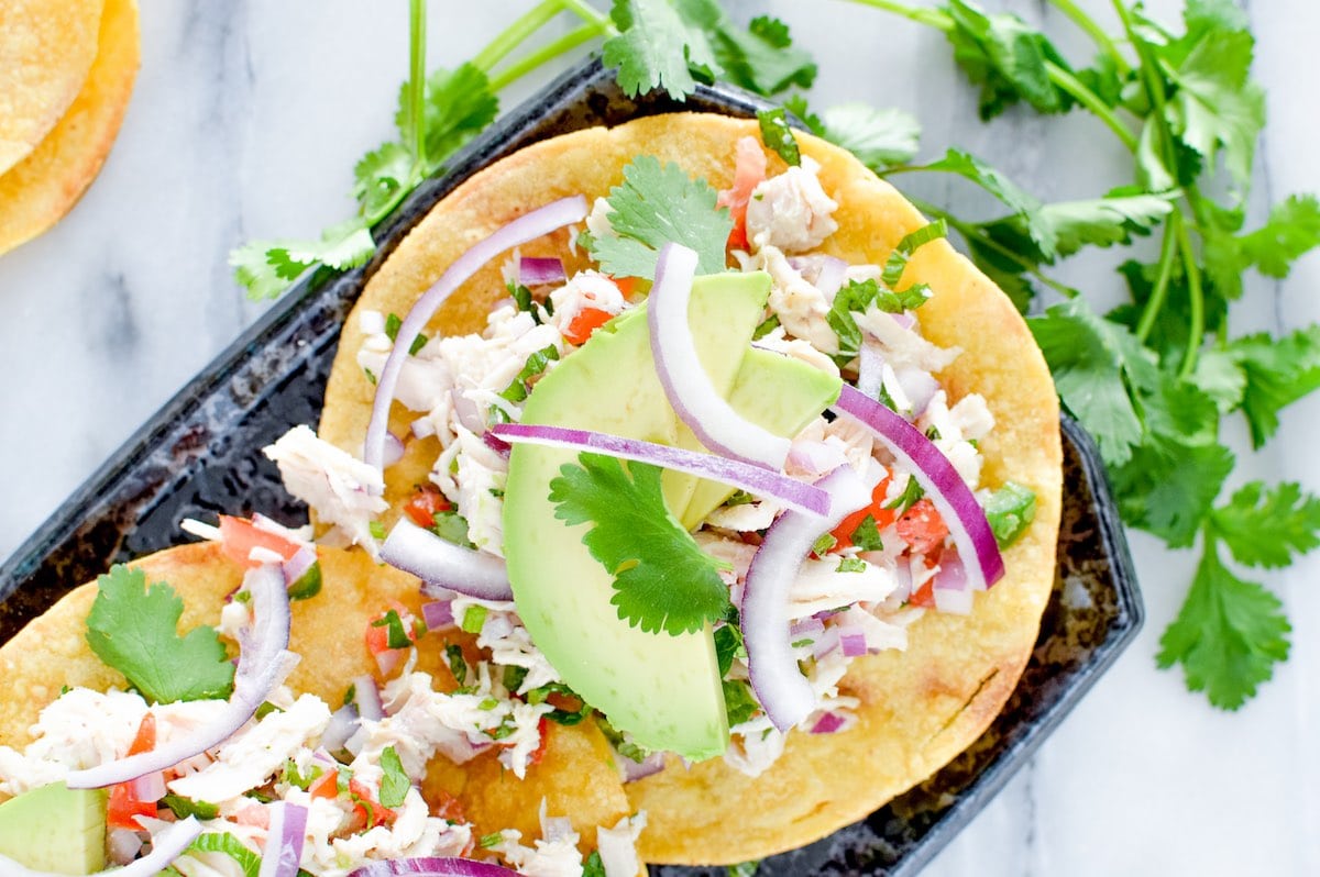 Close up of Mexican chicken salad on tostadas. 