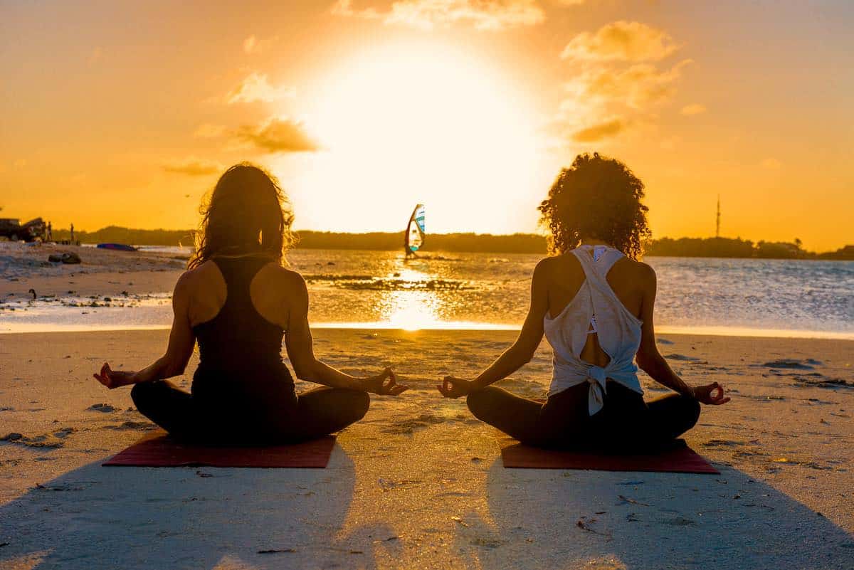 Two women doing yoga on Bonaire.