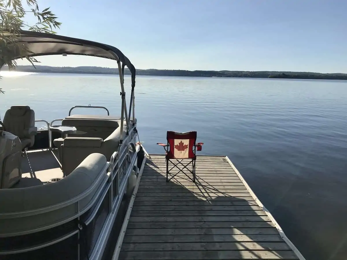 Bennington pontoon boat docked at Rice Lake.